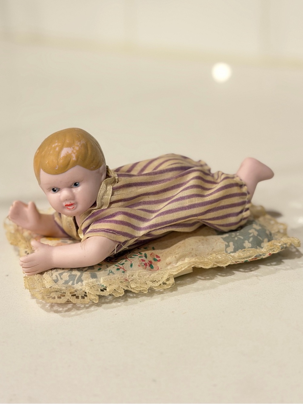Vintage Bisque Porcelain Piano Baby Figurine